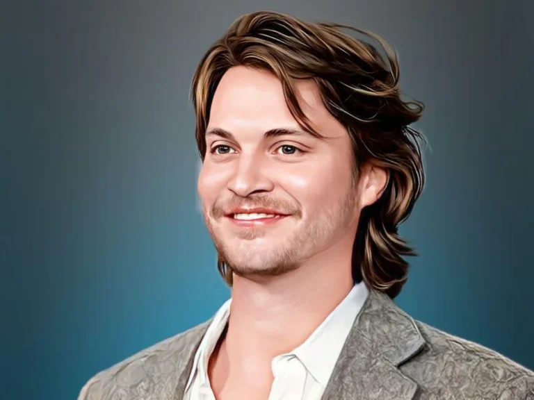Luke Grimes with long hair smiling
