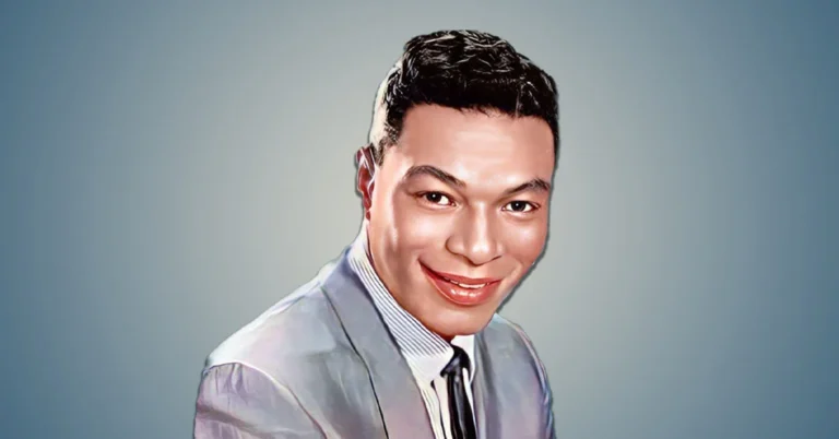 Nat King Cole in a suit and tie